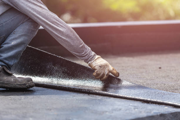 Professional Emergency Waterproofing technician working in Bedford, VA